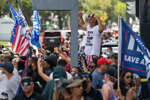 Supporters of former president Donald Trump outside the court building in Miami, Florida.