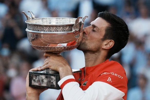 Serbia’s Novak Djokovic 2021 French Open victory kiss.