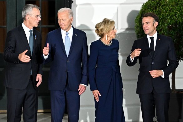 From left: NATO Secretary General Jens Stoltenberg, US President Joe Biden, First Lady Jill Biden and French President Emmanuel Macron at the White House on July 10.
