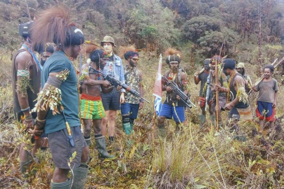 New Zealander pilot Phillip Mark Mehrtens held by independence fighters who stormed his single-engine plane shortly after it landed on a small runway in Paro in remote Nduga district, Papua, Indonesia.