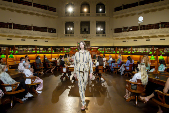 The Melbourne Fashion Festival was staged with restrictions during the COVID-19 outbreaks with a runway at the State Library in 2021. 