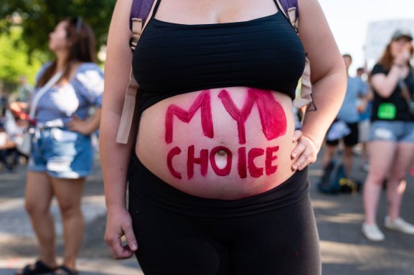 A slogan written on an abortion rights demonstrator’s body, outside the US Supreme Court on Saturday. 