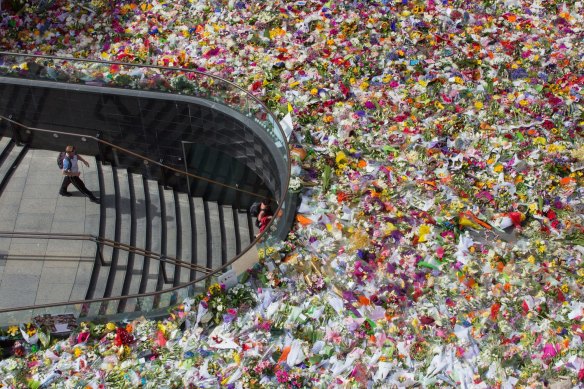 Thousands of floral tributes were placed in Martin Place for victims Tori Johnson and Katrina Dawson in the days following the siege.