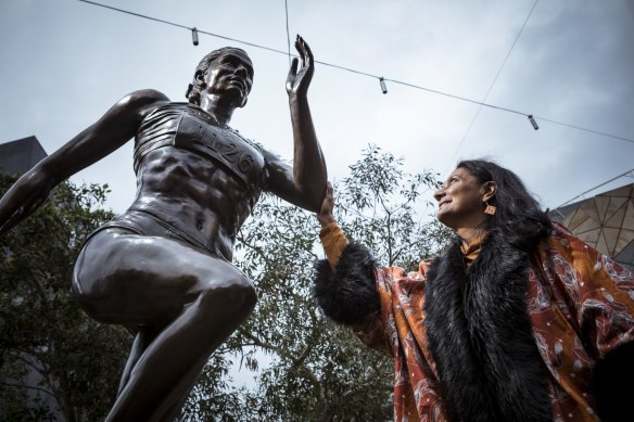 Nova Peris unveils the statue of her likeness at Federation Square in 2021.