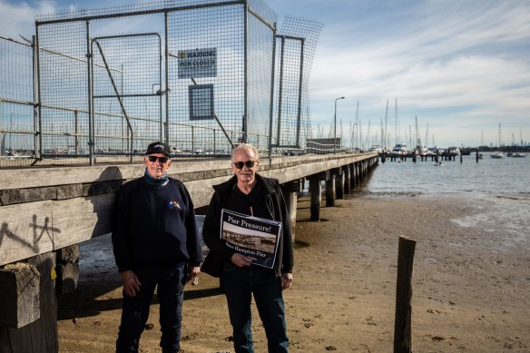 Graham White (right) from the Hampton Swing Mooring Association with John Barton at Hampton Pier.