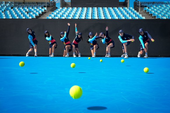 Australian Open ballkids hard at work.