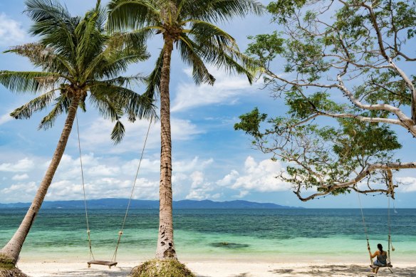 Take a 30-minute boat ride to neighbouring island, Koh Phangan.