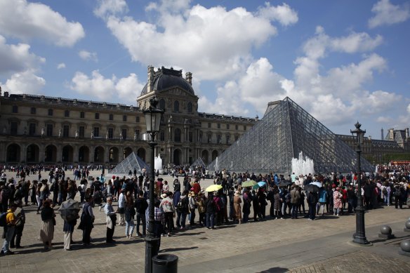 The Louvre attracts almost 9 million visitors a year, most of whom come to see the Mona Lisa.
