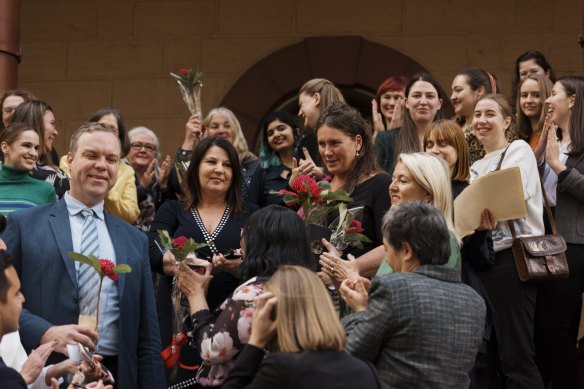 Supporters of the bill to decriminalise abortion celebrate outside Parliament House in 2019.