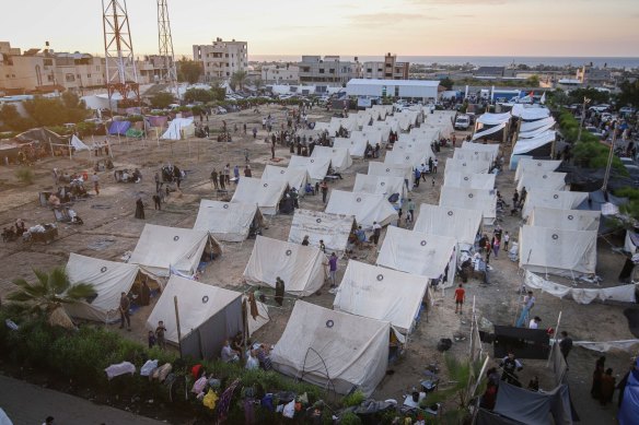 Displaced Palestinians at a camp operated by the United Nations Relief and Works Agency in western Khan Younis, Gaza.