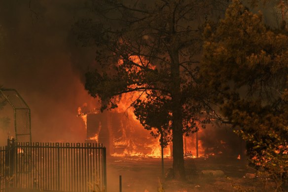 A house on fire that could not be saved in the fires on the outskirts of Bargo, NSW. 