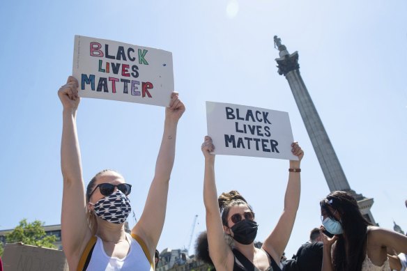 People take part in a Black Lives Matter protest in Trafalgar Square.