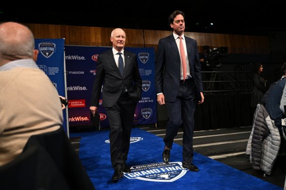 AFL Commission chair Richard Goyder (left) and AFL CEO Gillon McLachlan arrive to the North Melbourne Grand Final Breakfast.