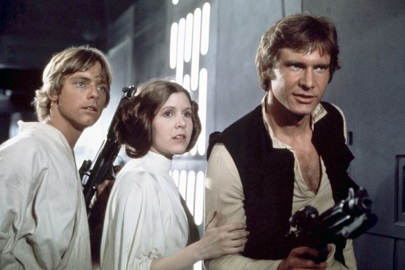 Mark Hamill, Carrie Fisher and Harrison Ford in the original Star Wars, 1977.