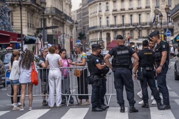 Police are everywhere in Paris and have been told to be polite to tourists.