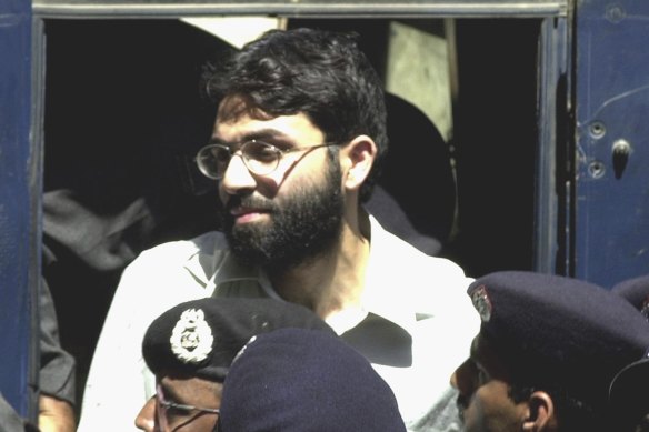 Ahmed Omar Saeed Sheikh, the alleged mastermind behind Wall Street Journal reporter Daniel Pearl's abduction, arrives at a court in Karachi, Pakistan, in 2002.