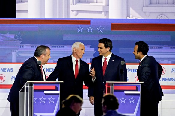 Chris Christie (left), Mike Pence, Ron DeSantis and Vivek Ramaswamy at the first Republican presidential debate, which was skipped by Donald Trump.