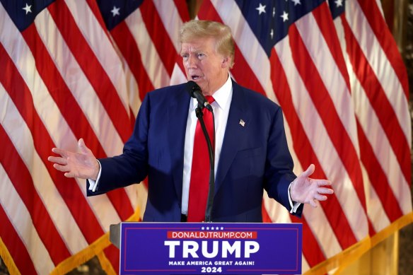 Former US President Donald Trump speaks at a news conference at Trump Tower.