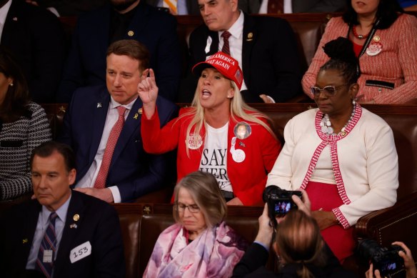 Marjorie Taylor Greene, Republican from Georgia, heckles President Joe Biden during the 2024 State of the Union address at the U.S. Capitol in Washington.
