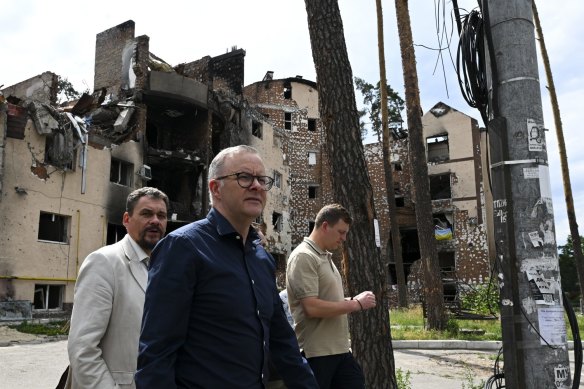 Australian Prime Minister Anthony Albanese tours damaged residential areas in Irpin on the outskirts of Kyiv, Ukraine, Sunday, July 3, 2022. 