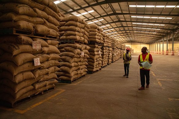 A warehouse stores sacks of cocoa beans for shipment abroad in San-Pedro, Ivory Coast.