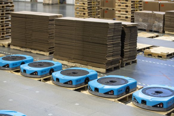 Amazon’s Hercules robots can carry heavy items across the company’s warehouses. 