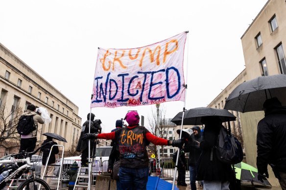 A protester outside the E. Barrett Prettyman US Court House in Washington as Trump appeared in court.