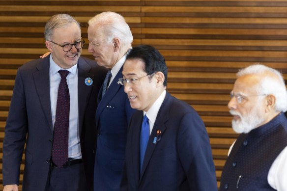 Prime Minister Anthony Albanese has a word with US President Joe Biden as they meet Japanese Prime Minister Fumio Kishida and Indian Prime Minister Narendra Modi.