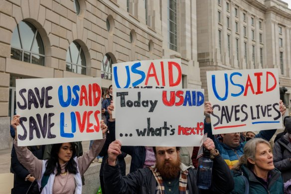 Supporters of the US Agency for International Development (USAID) outside its headquarters in Washington.