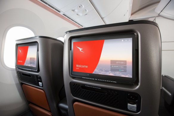 Qantas seatback screens in premium economy class.