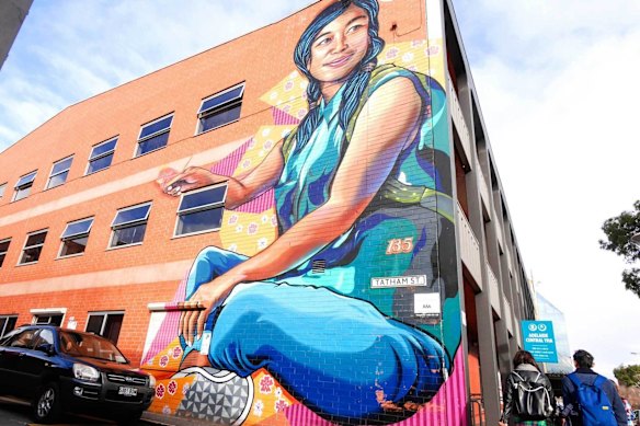 Hashtag Flower mural by artist Joel van Moore at YHA Adelaide Central.