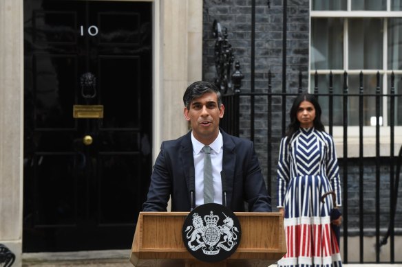 Rishi Sunak, pictured in Downing Street with his wife, Akshata Murty, on Friday morning (UK time), resigns as Tory leader.