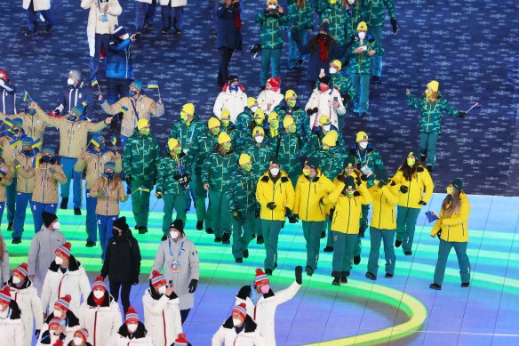 Members of the Australian team make their way around the stadium during the closing ceremony on Sunday night.