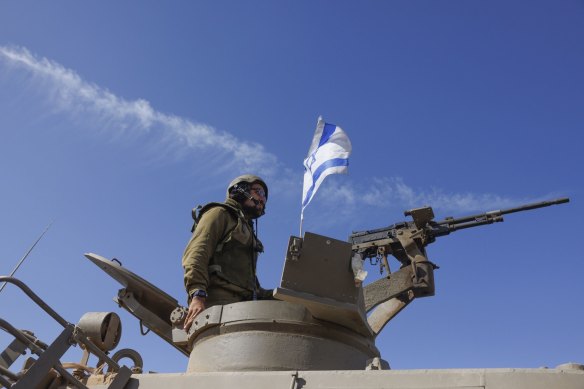 An Israeli solider at an artillery base near the border with Lebanon. Hezbollah has nearly 10 times the number of missiles as Hamas and a bigger, more professional fighting force. 