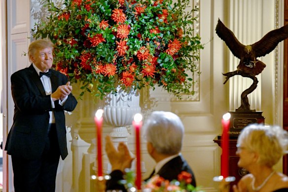 Trump gifted President Xi and Madam Peng a bald eagle statue - a gift he has bestowed on others this term.