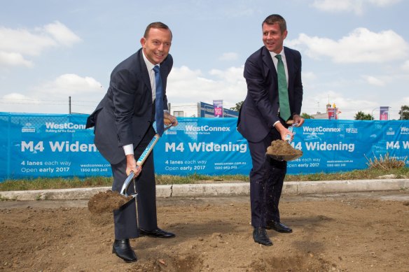 Digging in: Prime Minister Tony Abbott and NSW Premier Mike Baird at a WestConnex press call in 2015.