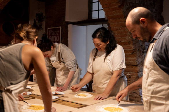Making pasta at Emiko Davies’ Enoteca Marilù cooking school and wine bar in Tuscany. 