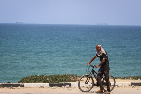 The US Navy ship MV Roy P. Benavidez (right) and other vessels off the coast of Central Gaza on Sunday.