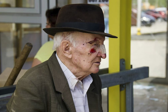 An elderly injured man waits for medical treatment after Russia’s missile attack in Dnipro, Ukraine.