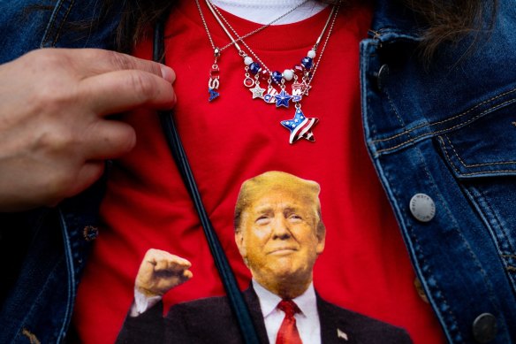 An attendee wears a Trump shirt ahead of a campaign event for former US president Donald Trump in Clinton Township, Michigan.