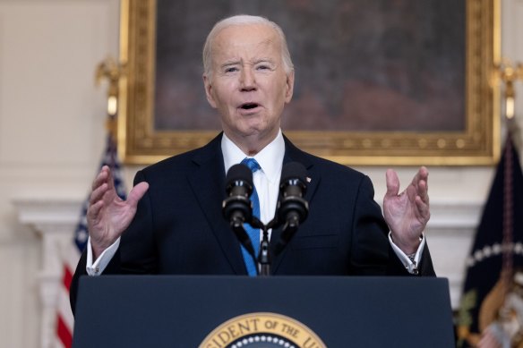 US President Joe Biden speaks in the State Dining Room of the White House after an all-night session where the Senate voted to approve a large package of assistance for Ukraine, Israel and Taiwan after months of delay.