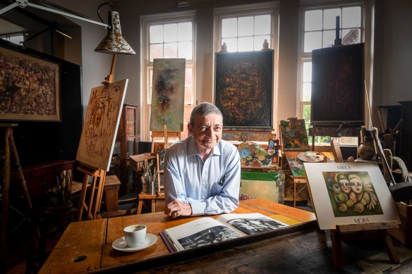 William Mora in a studio in 2019 with all of his mother’s studio equipment including the last painting she was working on before she passed away (left).