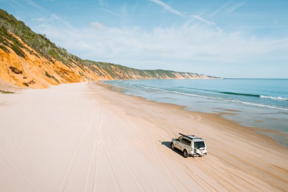 Dramatic hues of the seaside cliffs at Rainbow Beach, a popular camping spot.
