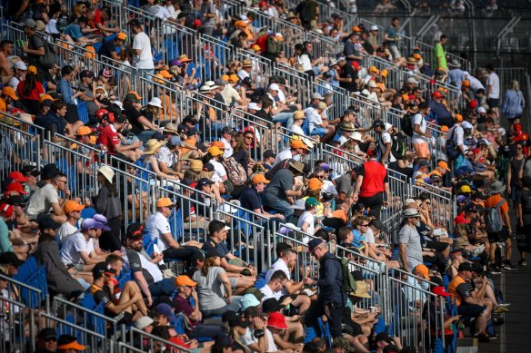 Crowds enjoy grand prix racing at Albert Park yesterday.