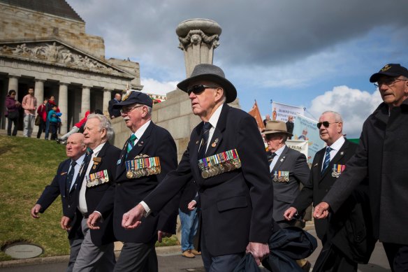 Veterans marching on the 52nd Anniversary of the Battle of Long Tan at the Shrine of Remembrance in Melbourne. 
