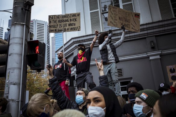 Protesters urging action on Indigenous deaths in custody at the Black Lives Matter rally in Melbourne.
