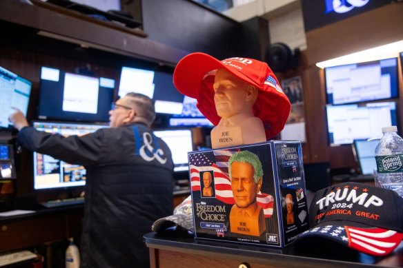 Joe Biden and Donald Trump hats and merchandise on the floor of the New York Stock Exchange. 