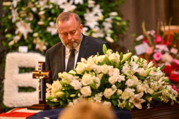 Kimberley Kitching’s husband Andrew Landeryou at her funeral.