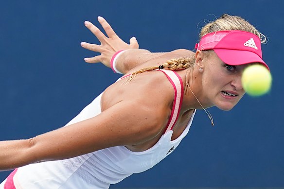 Kristina Mladenovic, of France, returns a shot to Varvara Gracheva, of Russia. 