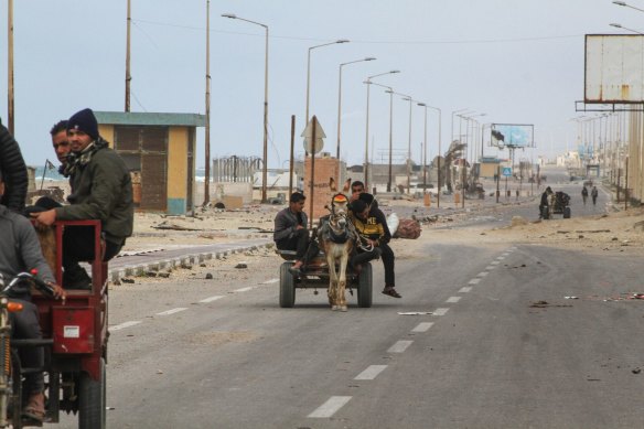 Displaced Palestinians on the coastal road after fleeing the Al-Shifa hospital area of Gaza City near Nuseirat camp, central Gaza, last week.
